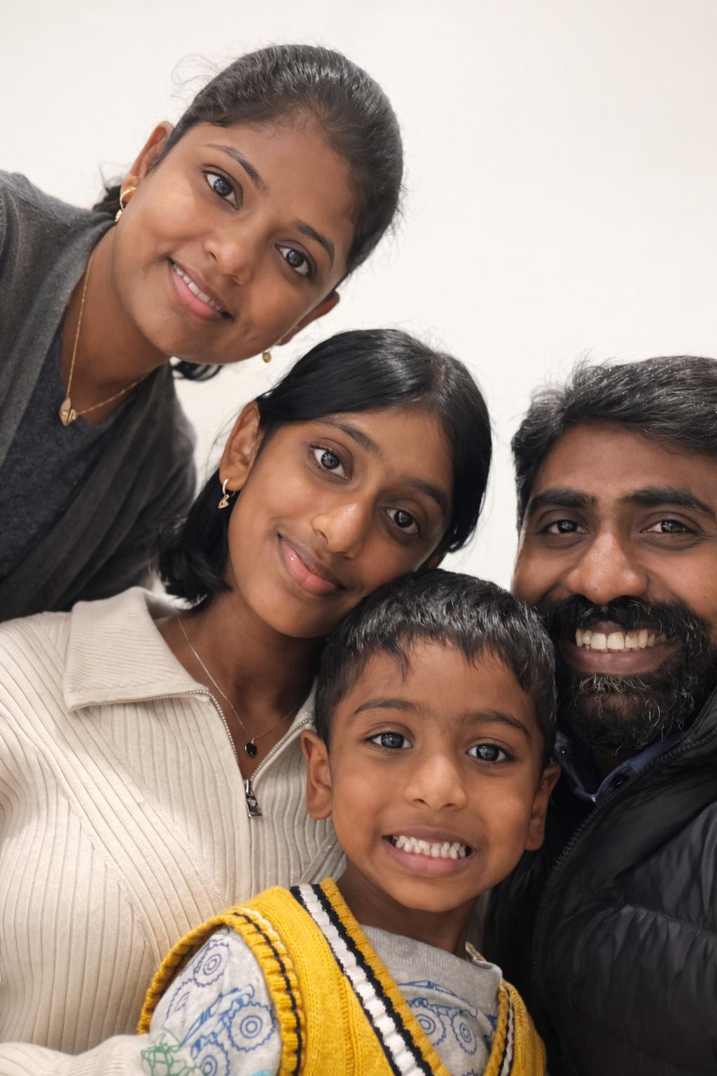 Senthil and Muthu with their family — founders of Little Roses Early Learning